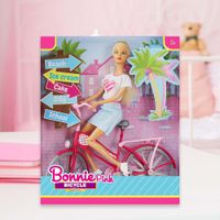 Muñeca en Bicicleta 11.5 plg