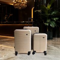 Set de 3 Maletas Doradas con Ruedas Giratorias