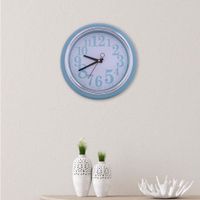 Reloj Con Movimiento Orilla Celeste 25.4x5x25.4 Cm - Concepts